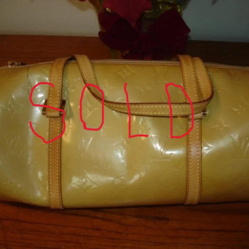 Auth. Louis Vuitton yellow patent Bedford